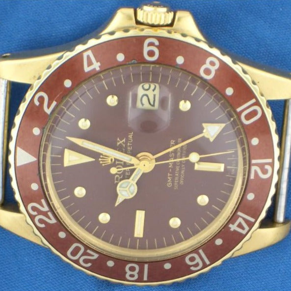 Rolex gmt master I ref. 1675 oro giallo occhio di tigre