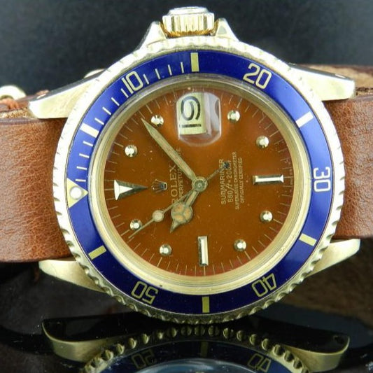 Rolex submariner 1680 cassa oro quadrante marrone